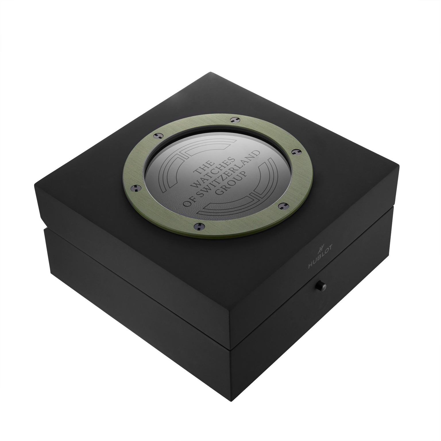 A black box with a round metal plaque engraved with The Watches of Switzerland Group, this limited-edition case is ideal for the Hublot Big Bang Unico The Watches of Switzerland Group Exclusive and features a front button.
