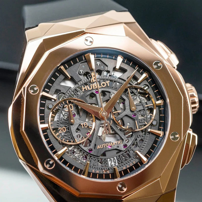 Close-up of the Hublot Classic Fusion Aerofusion King Gold, featuring a rose gold case, skeleton dial, chronograph subdials, and visible mechanics—a modern luxury icon.