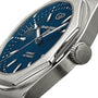 Close-up of the Girard-Perregaux Laureato 42 automatic wristwatch featuring an octagonal bezel, blue textured dial, silver markers, and a brushed stainless steel case.