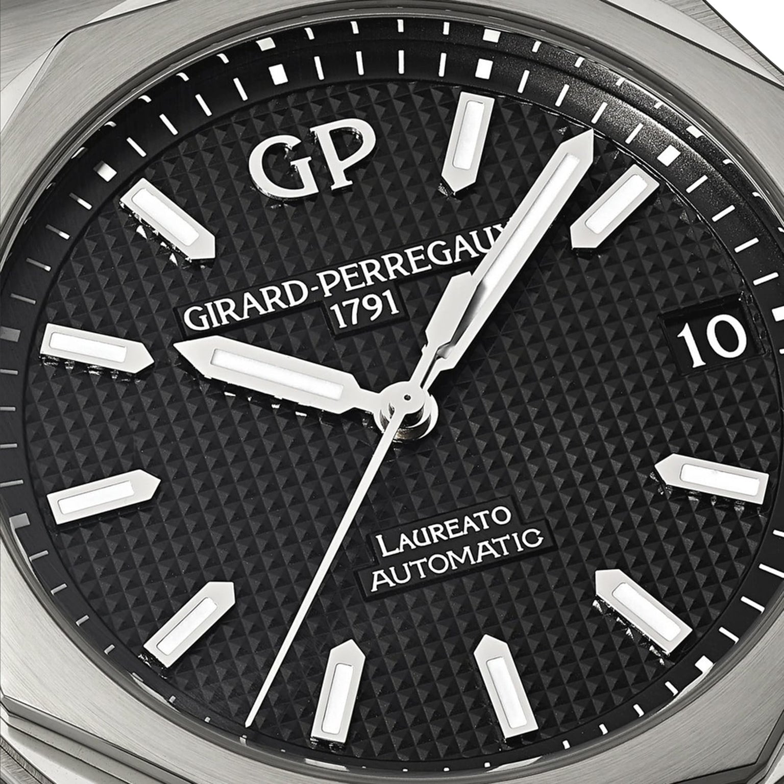 Close-up of a Girard-Perregaux Laureato 42 watch face at 1:52:26, showing its octagonal bezel, textured black dial, silver hour markers, and 42mm stainless steel case.