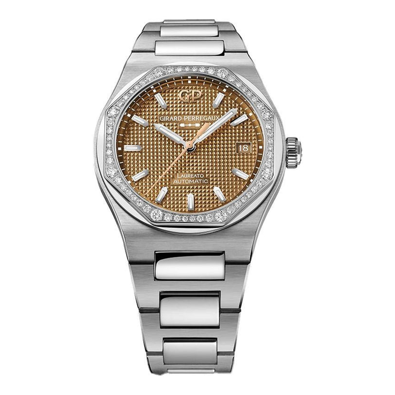 The Girard-Perregaux Laureato 38 features a textured gold dial, octagonal diamond-set bezel, date display at 3 o’clock, and a stainless steel bracelet.