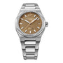 The Girard-Perregaux Laureato 38 features a textured gold dial, octagonal diamond-set bezel, date display at 3 o’clock, and a stainless steel bracelet.