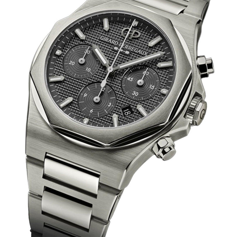 The Girard-Perregaux Laureato Chronograph Ti49 is an iconic wristwatch featuring a black textured dial, three subdials, and a date window.