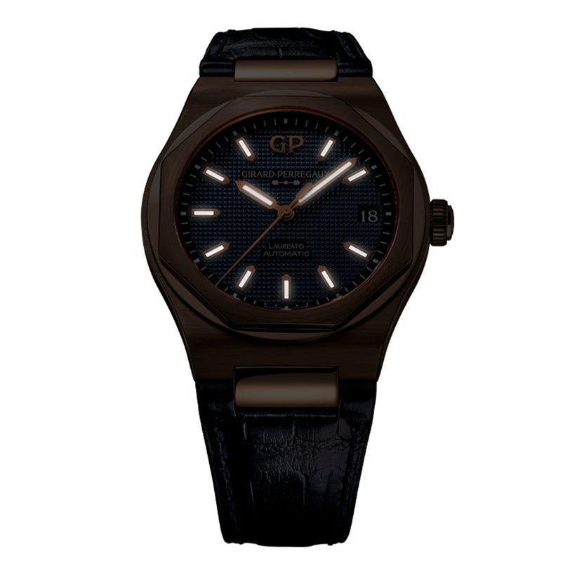 A Girard-Perregaux Laureato 42 with a black textured dial, luminous hour markers, and a black leather strap is displayed on a white background, highlighting the sophistication of the Laureato Pink Gold case collection.