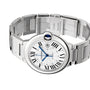 The Ballon Bleu de Cartier by Cartier features a round steel case, Roman numerals, blue cabochon crown, stainless steel bracelet, and a self-winding mechanical movement.