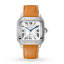 The Cartier Santos de Cartier wristwatch features a square silver case, silvered opaline dial with Roman numerals, blue hands, and a light brown leather strap—blending precision proportions with classic elegance.