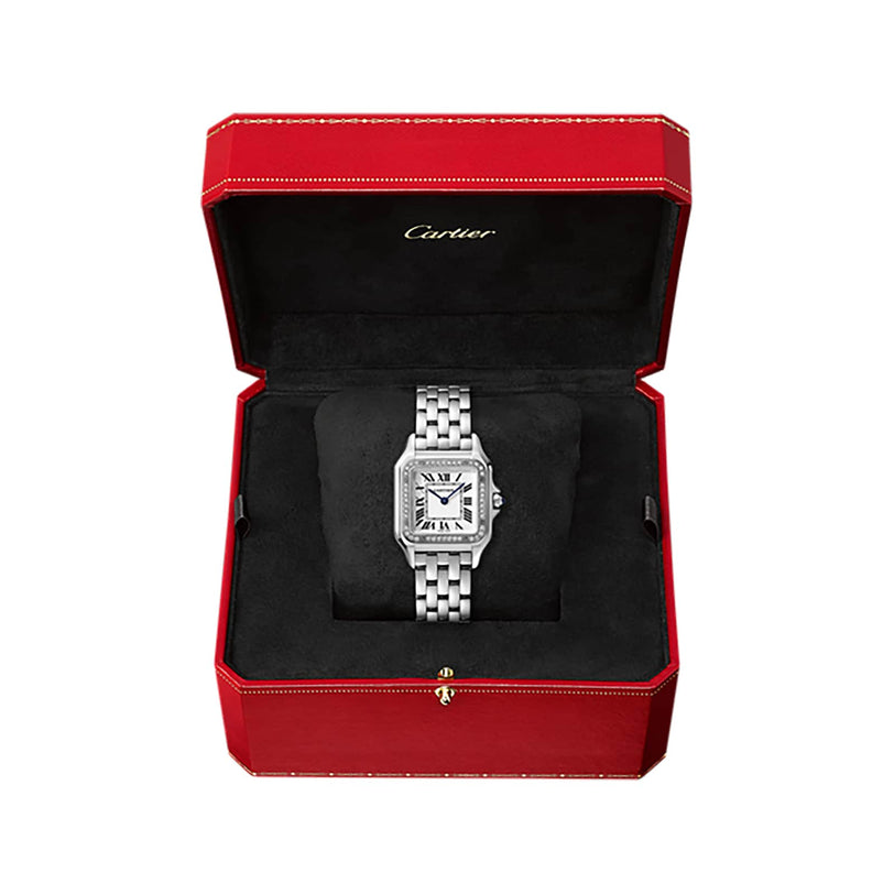 The Panthère de Cartier, a silver jewellery watch with a rectangular face and Roman numerals, is displayed in a red, velvet-lined Cartier box.