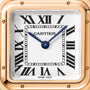 Close-up of the Cartier Panthère de Cartier watch, featuring black Roman numerals, blue hands, a rose gold square case, and a blue sapphire crown at 1:50—an elegant and timeless design by Cartier.