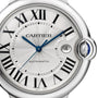 Close-up of the Ballon Bleu de Cartier by Cartier, featuring a silver textured dial with Roman numerals, blue hands, and a date window at 3 o’clock—radiating timeless elegance.