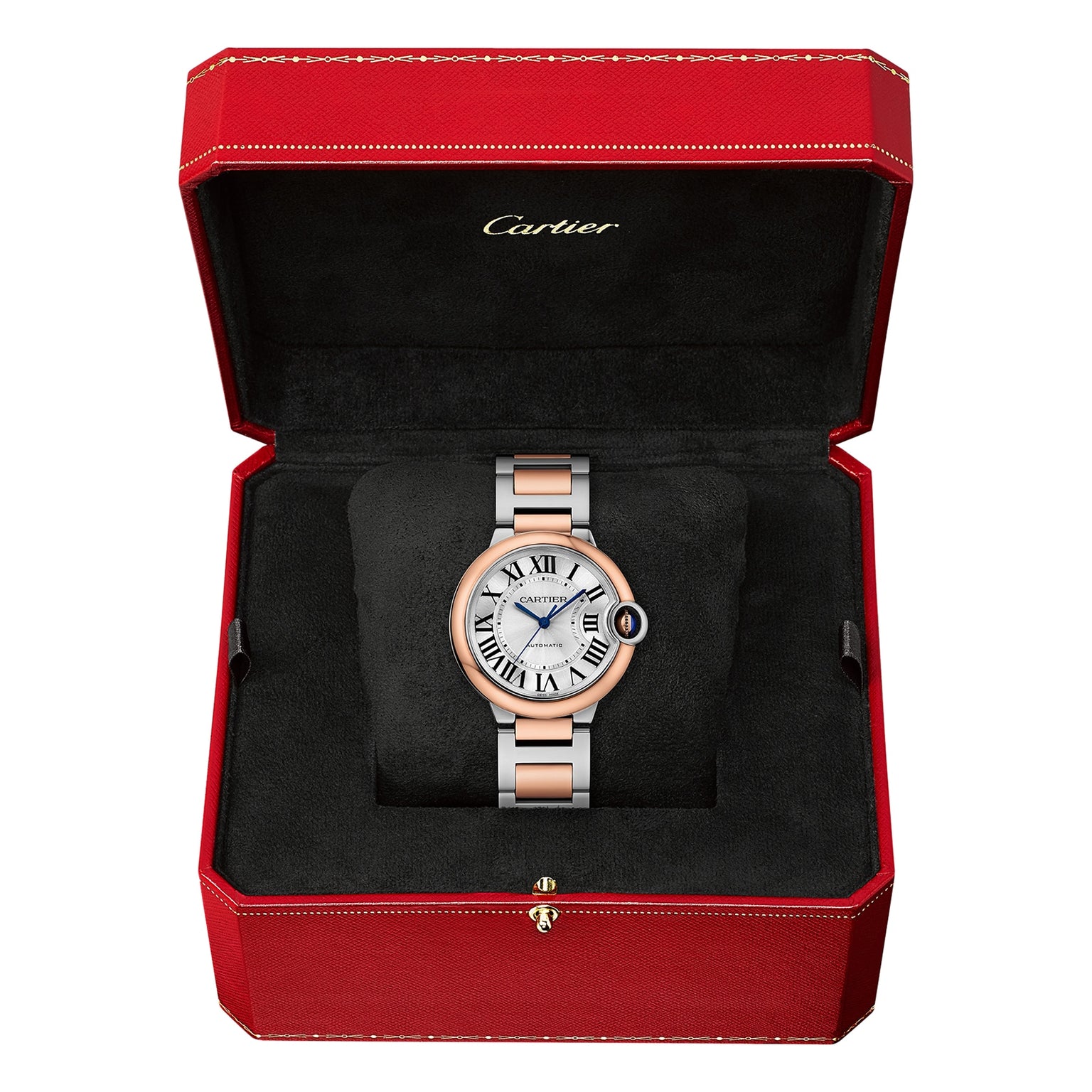 The Ballon Bleu de Cartier watch by Cartier, featuring a silver and rose gold interchangeable bracelet, is displayed in an open red Cartier box with a black interior.