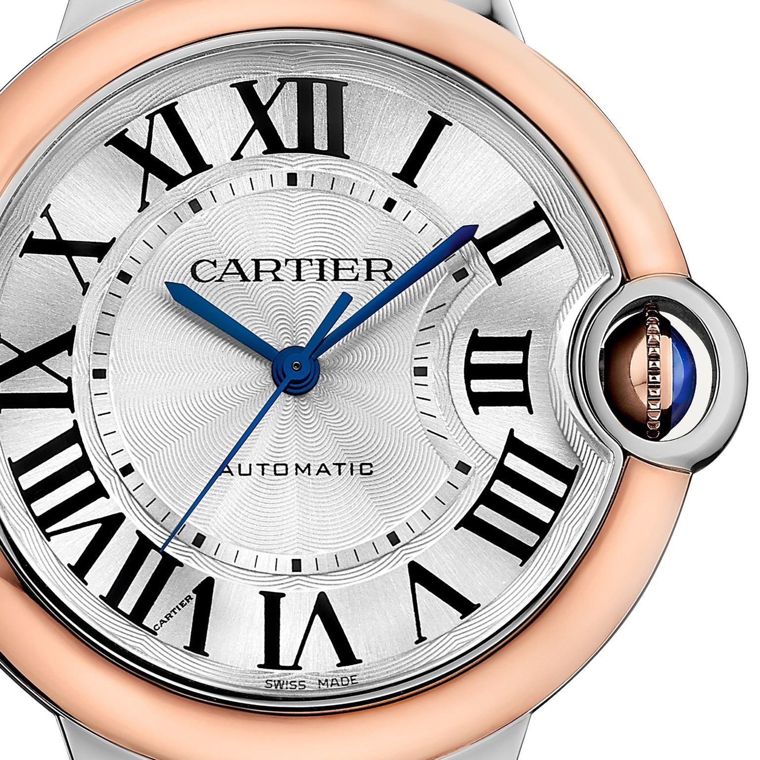 Close-up of a Cartier Ballon Bleu de Cartier watch featuring a rose gold bezel, Roman numerals, blue hands, and a silver dial showing the time as 10:09.