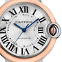 Close-up of a Cartier Ballon Bleu de Cartier watch featuring a rose gold bezel, Roman numerals, blue hands, and a silver dial showing the time as 10:09.