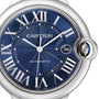 Close-up of a Cartier Ballon Bleu de Cartier watch featuring a blue guilloché dial, Roman numerals, silver hands, a date window at 3 oclock, and AUTOMATIC above 6 oclock.