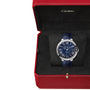 The Ballon Bleu de Cartier by Cartier with a blue guilloché dial and blue leather strap is presented in an open red Cartier box.