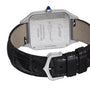 The back of a Pasha de Cartier wristwatch with a black leather strap shows engraved branding and model details on the stainless steel case, embodying Cartier’s signature minimalism.
