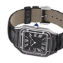 The Pasha de Cartier wristwatch by Cartier features a square face, black leather strap, black dial with white Roman numerals, and a blue gem-set crown—a celebration of geometric shapes and timeless elegance.