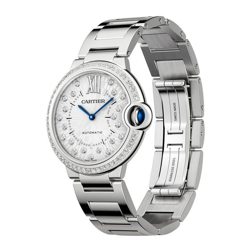 The Cartier Ballon Bleu de Cartier is a silver automatic watch with diamond markers, Roman numerals, a sunray grey dial, gem-set crown, and interchangeable steel bracelet.