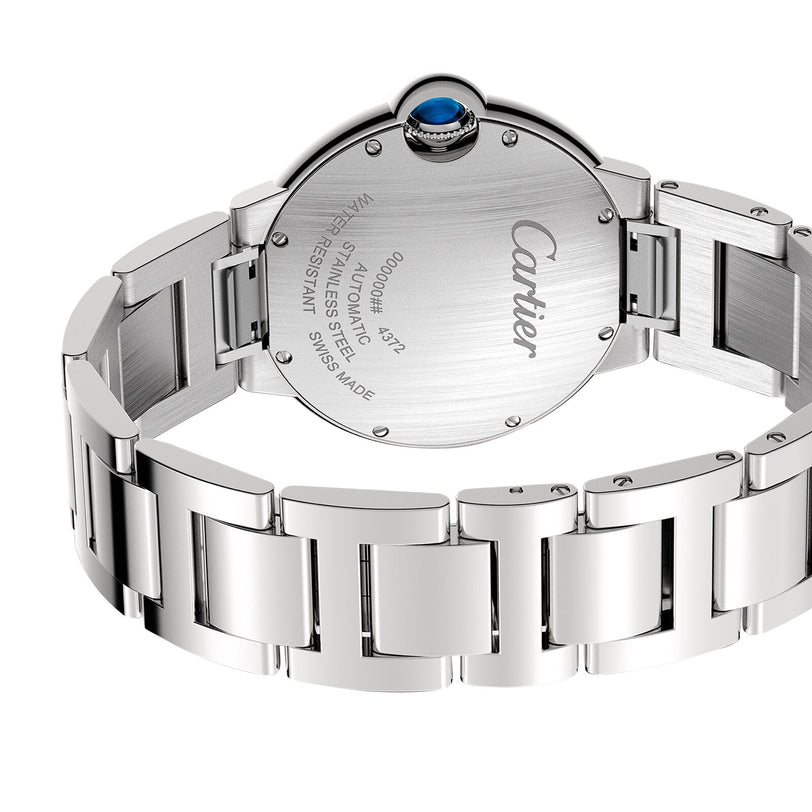 Back view of the Cartier Ballon Bleu de Cartier watch with an engraved case back and interchangeable steel bracelet; showcases a refined sunray grey dial designed with elegance and precision.