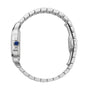 Side view of Cartier’s Santos de Cartier wristwatch with a silver square steel case, stainless steel band, and blue crown, inspired by the iconic model created for Alberto Santos-Dumont, shown on a white background.