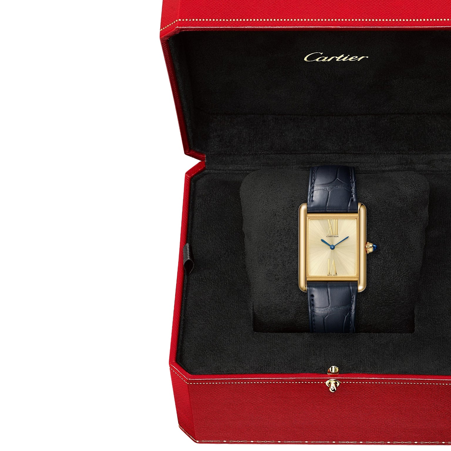 A Cartier Tank Américaine wristwatch with a blue leather strap is displayed in an open red Cartier box lined with black fabric, highlighting its refined Art Deco elegance.