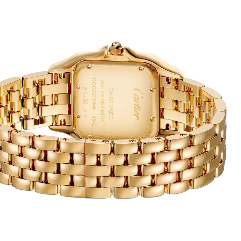 Close-up of the Panthère de Cartier by Cartier in yellow gold, highlighting its “Swiss Made” marking and the elegant details of its metal link bracelet.