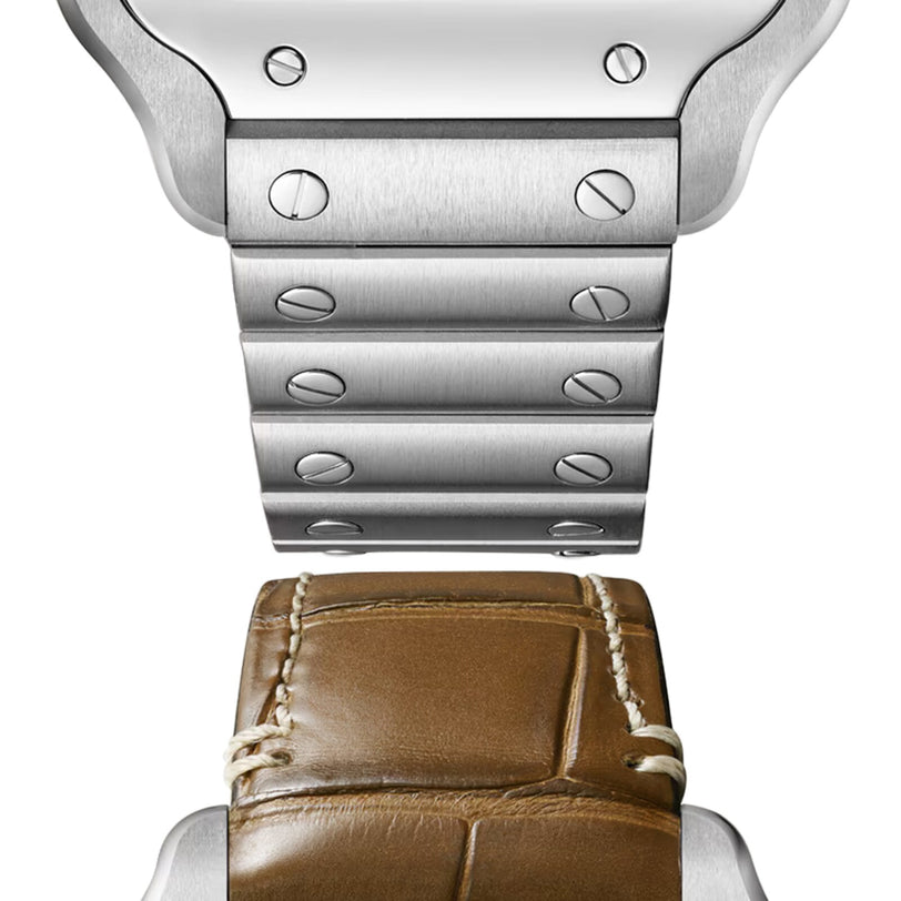Close-up of a Santos de Cartier watch by Cartier, featuring a metal bracelet seamlessly transitioning to a brown leather strap with visible stitching, highlighting minimalist design and meticulous craftsmanship.