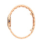 The Cartier Panthère de Cartier Small Model watch in rose gold is displayed from the side, showcasing its linked bracelet, clasp, and a vibrant blue sapphire set on the crown.