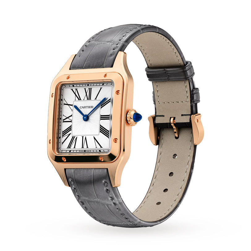 A Cartier Santos-Dumont gold watch with a square face, Roman numerals, blue hands, and an alligator leather strap is displayed on a white background.