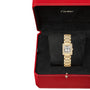A Cartier Tank Française wristwatch with a rectangular face is shown inside an open red Cartier box with a black interior.