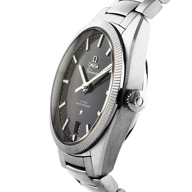 A close-up side view of the OMEGA Constellation Globemaster highlights its stainless steel case, black dial, silver hour markers, and metal bracelet.