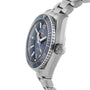 The OMEGA Seamaster Planet Ocean 600M dive watch features a stainless steel case, blue dial, silver hour markers, and a metal link bracelet, displayed from a side angle.