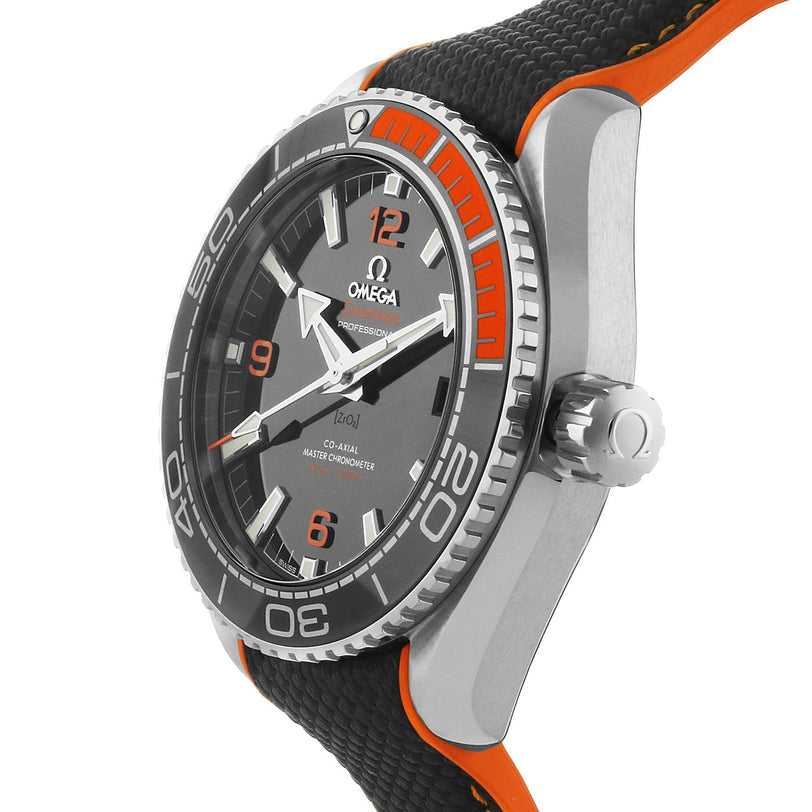 A close-up of the OMEGA Seamaster Planet Ocean 600M, featuring a black and orange bezel, black textured strap, silver casing, and part of its Master Chronometer-certified face.