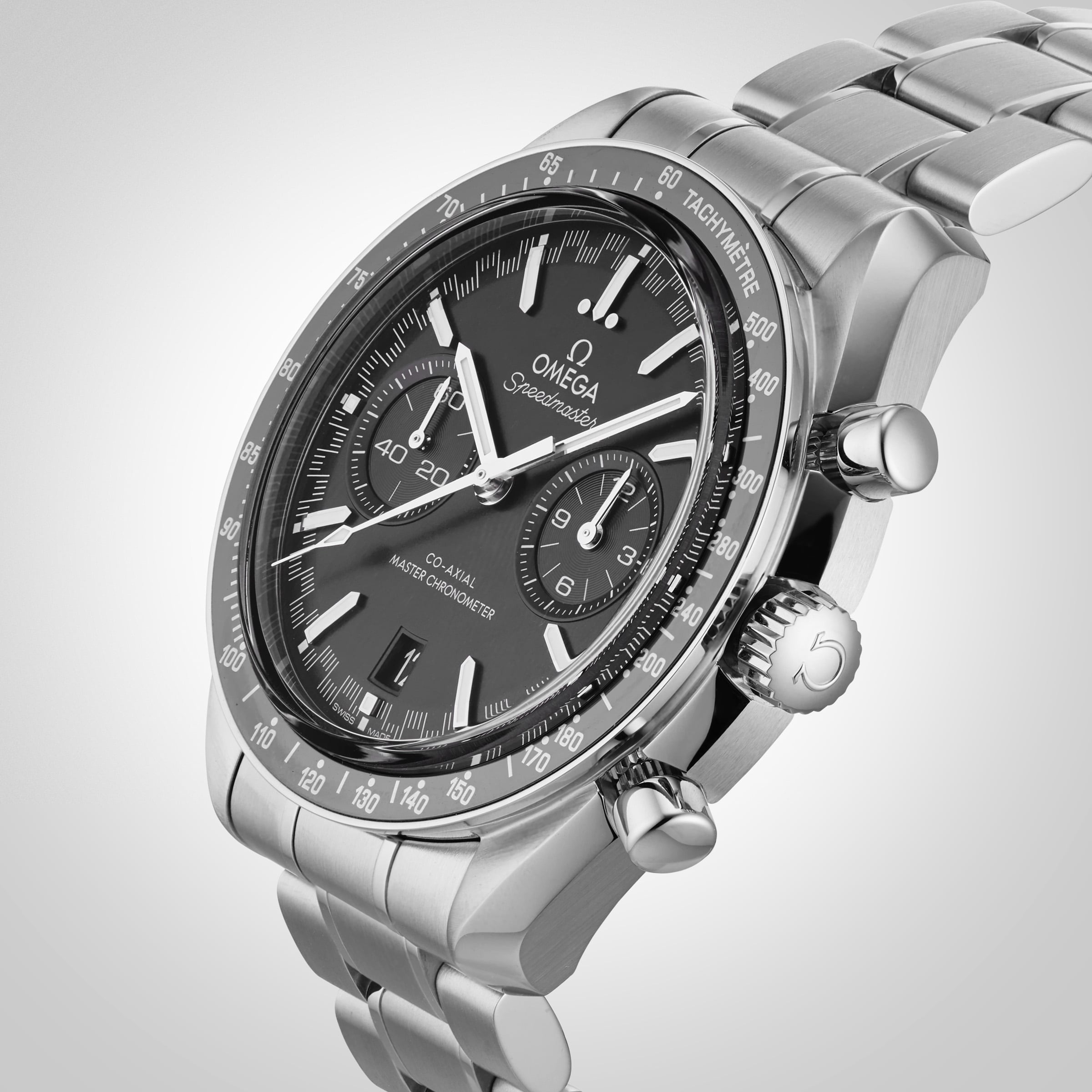 A close-up of the OMEGA Speedmaster Racing, featuring a black dial with three subdials, tachymeter bezel, and stainless steel bracelet—highlighting the precision of this Master Chronometer.