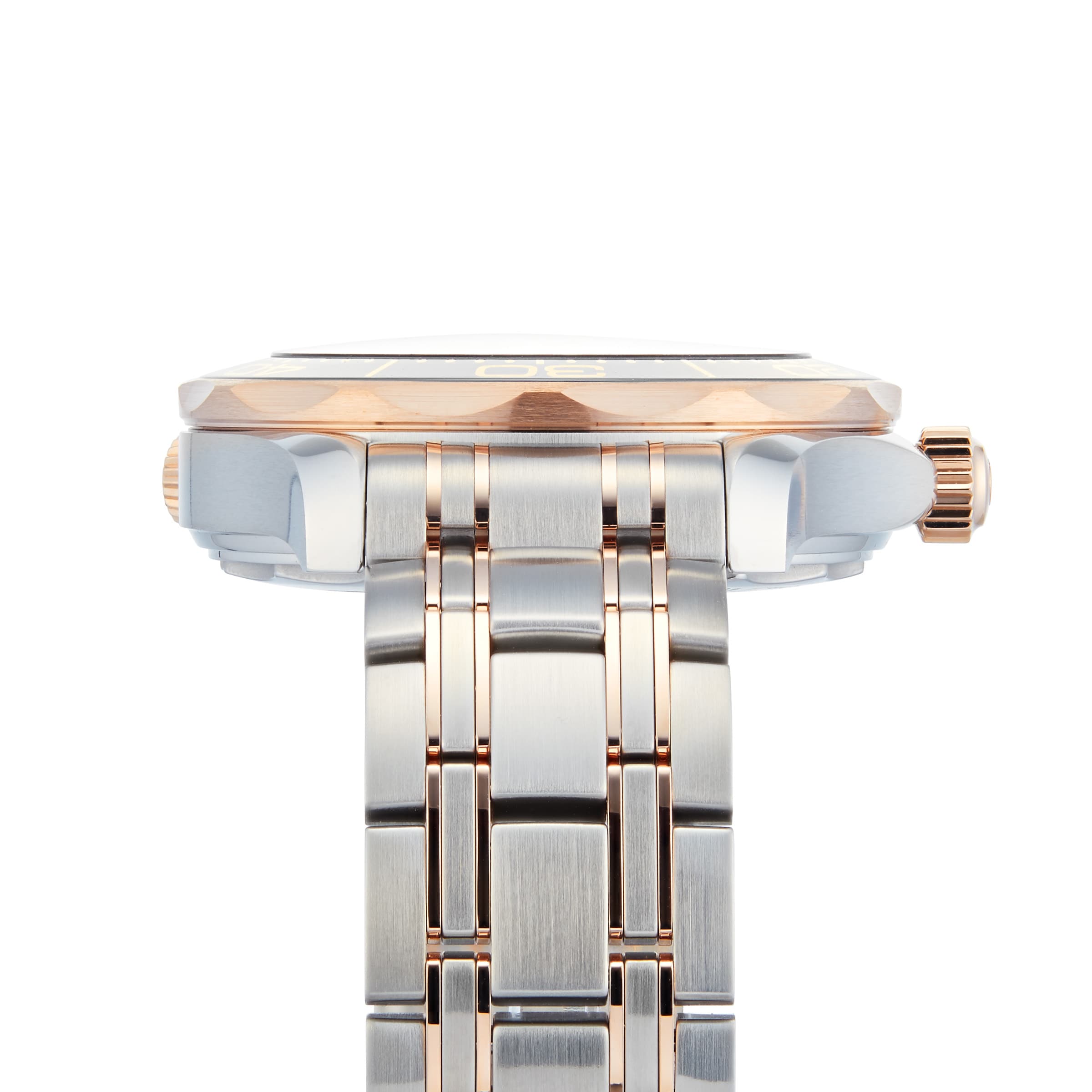 Close-up side view of an OMEGA Seamaster Diver 300M wristwatch in silver and rose gold with a metal link band and prominent right-side crown, reflecting the sophisticated style of James Bond.