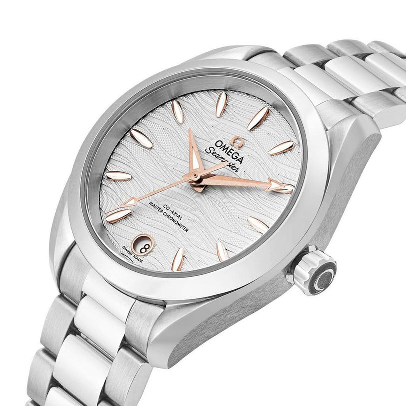 An OMEGA Seamaster Aqua Terra 150M watch in stainless steel with a silver textured dial, rose gold hour markers and hands, and a metal bracelet, shown at an angle.