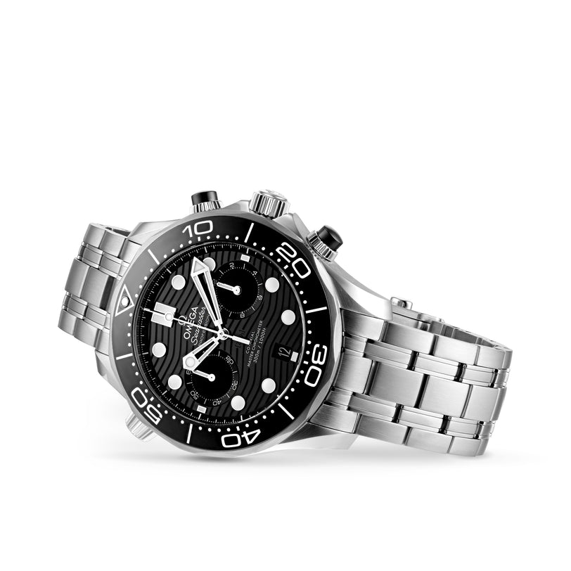 The OMEGA Seamaster Diver 300M is a stainless steel dive watch with a black dial, three subdials, rotating bezel, and white hour markers and hands.