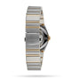 A close-up of the OMEGA Constellation’s two-tone bracelet in 18K yellow gold, showing the Omega logo engraved on the clasp.