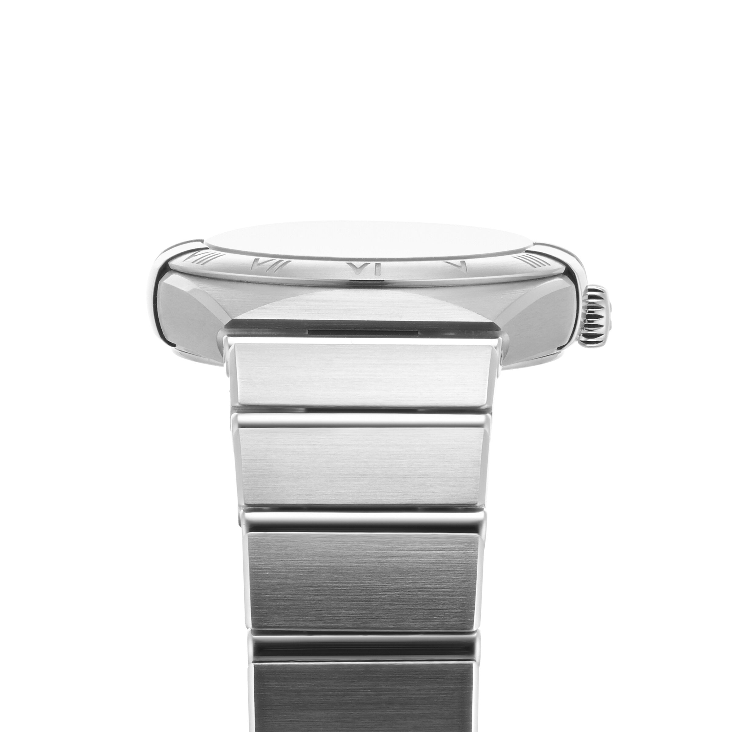 Side view of an OMEGA Constellation watch with a 28mm stainless steel round case, metal band, Roman numeral bezel, and ridged crown.