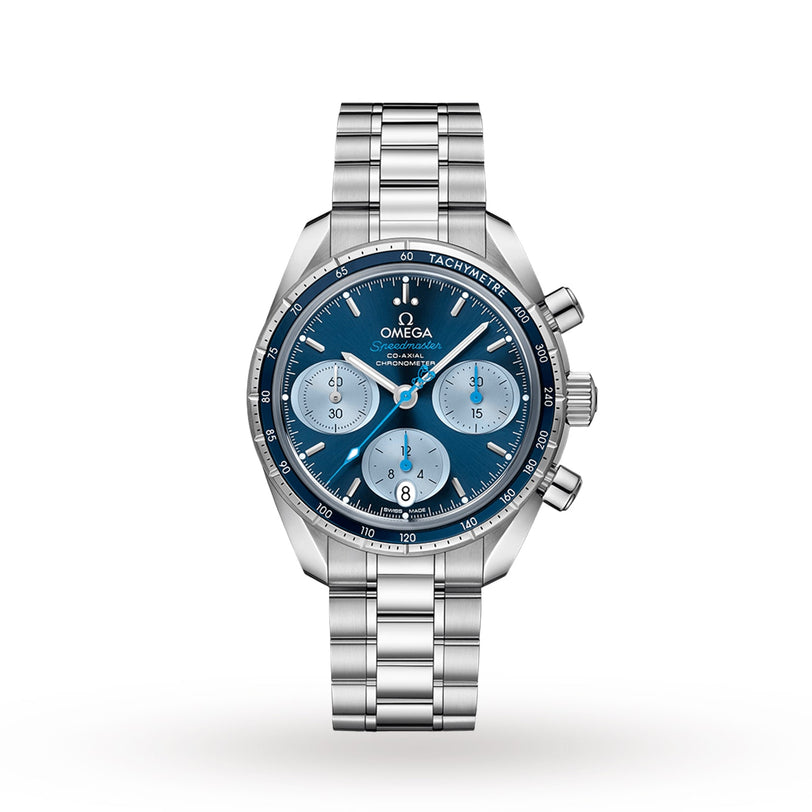 An OMEGA Speedmaster 38 Orbis Edition chronograph with a stainless steel case, blue dial, three subdials, tachymeter bezel, and metal bracelet is displayed on a white background. This special edition supports Orbis International.