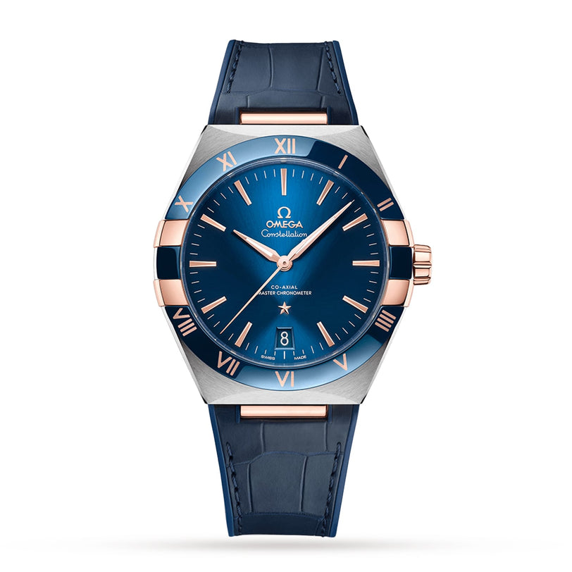 The OMEGA Constellation is a blue wristwatch featuring a blue leather strap, gold accents, Roman numerals, date at 6 o’clock, and is powered by the Master Chronometer certified 8900 calibre movement.