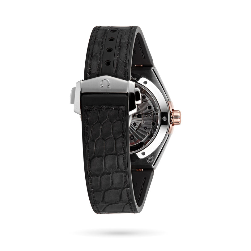 Rear view of an OMEGA Constellation luxury watch with a black textured leather strap, visible clasp, and the Master Chronometer-certified 8900 calibre movement on display through its transparent case back.