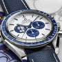A close-up of the OMEGA Speedmaster Snoopy Award Anniversary Series watch with blue and white accents, Snoopy illustration, chronograph subdials, and a tribute to the Silver Snoopy Award—showcasing its iconic Speedmaster legacy.