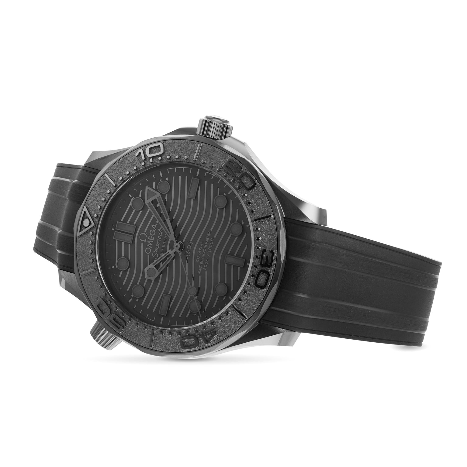 The OMEGA Seamaster Diver 300M Black Black Edition features a wavy dial, bold bezel numbers, black rubber strap, and OMEGA Calibre 8800, shown at an angle on a white background.