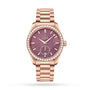 The OMEGA Seamaster Aqua Terra 150M in 18K Sedna gold features a pink textured dial, diamond bezel, date at 6 o’clock, matching bracelet, and is powered by the Co-Axial Master Chronometer calibre 8803.