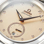 Close-up of the OMEGA Seamaster Aqua Terra 150M watch face with diamond hour markers, sub-seconds dial, date display, gold-toned hands, and precision 8802 calibre movement—a tribute to OMEGA’s maritime legacy.