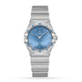 An OMEGA Constellation wristwatch featuring a celestial blue dial with Roman numerals and a stainless steel bracelet, shown on a white background.