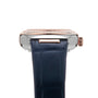 Close-up side view of the OMEGA Constellation, showcasing a blue leather strap, silver case, rose gold crown, diamond-set bezel, and an Aventurine stone dial.