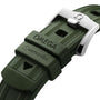 Close-up of a green OMEGA Seamaster Diver 300M rubber watch strap with silver buckle, featuring embossed branding—designed for water resistance and tailored for the Seamaster Diver 300M.