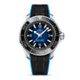 A close-up of an OMEGA Seamaster Planet Ocean 600M wristwatch with a blue and black dial, white markings, and a black strap with blue edges, featuring the robust O-MEGASTEEL case and precise 8912 calibre movement.