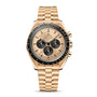 The OMEGA Speedmaster Moonwatch Professional features a gold case, three subdials, black bezel, Moonshine™ dial, and matching gold metal bracelet, all showcased against a white background.